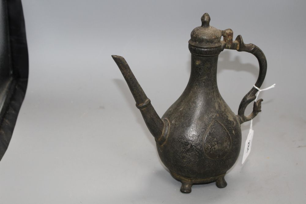 Two late 18th century Mughal brass ewers, H.11in. and 9.75in.